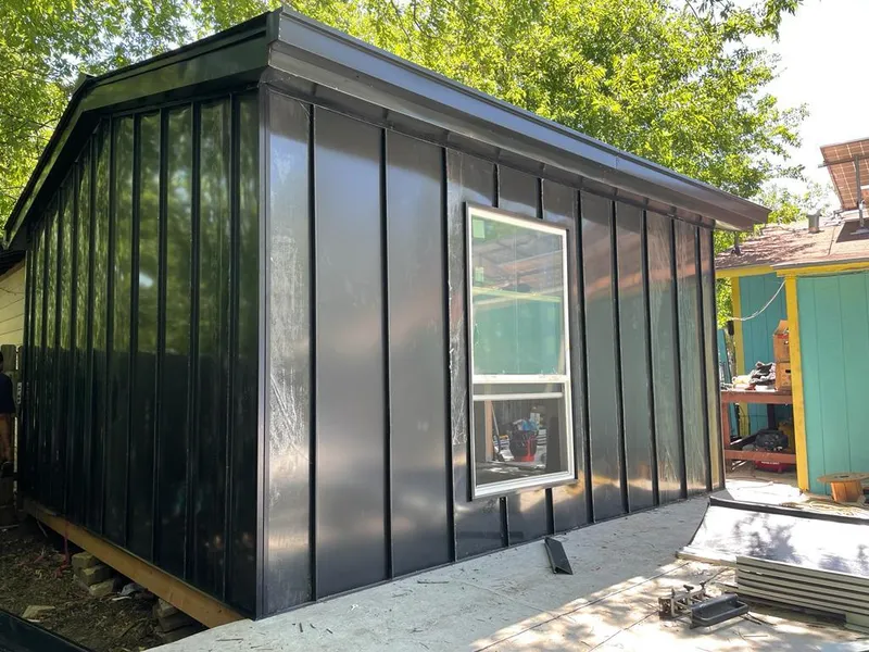 Black standing seam metal wall panels for Metal Roof Installation in Mill Creek East